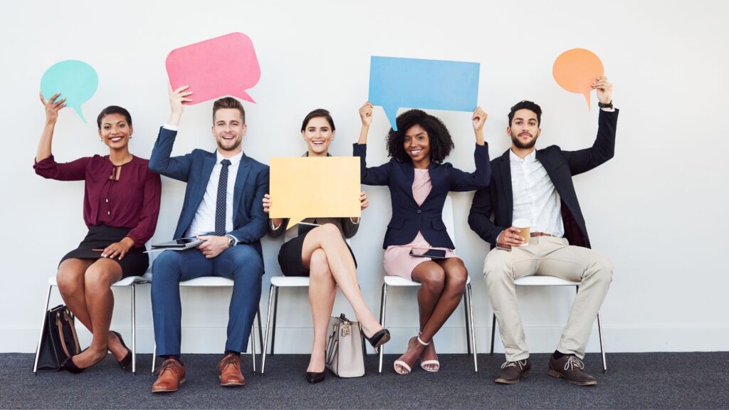 a diverse workforce holding chat bubbles