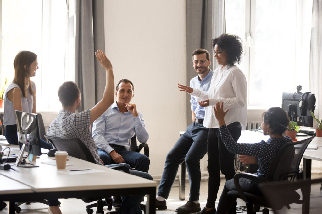 employees and an hr manager participating in an employee engagement program