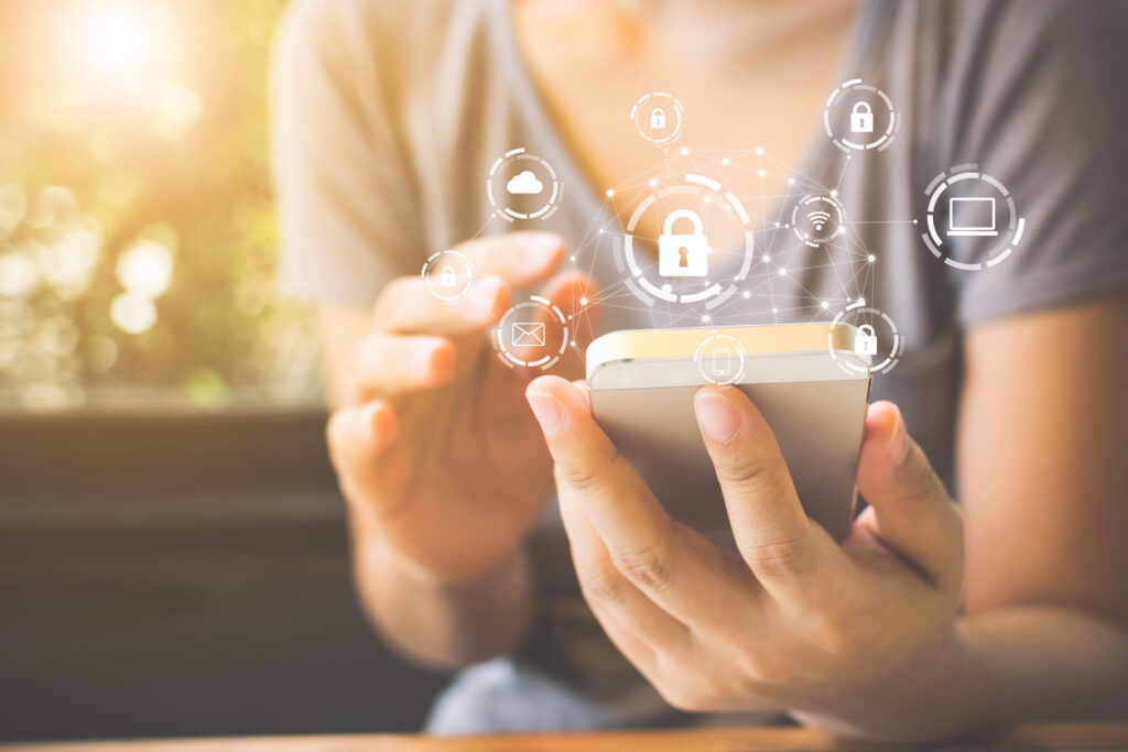 Woman using smartphone with icon of remote team communication tools