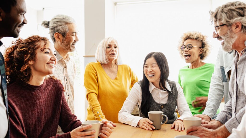 different employees with different ages to depict generational diversity in a workplace